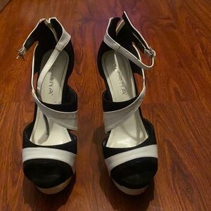 Gently used black and white open toe heels